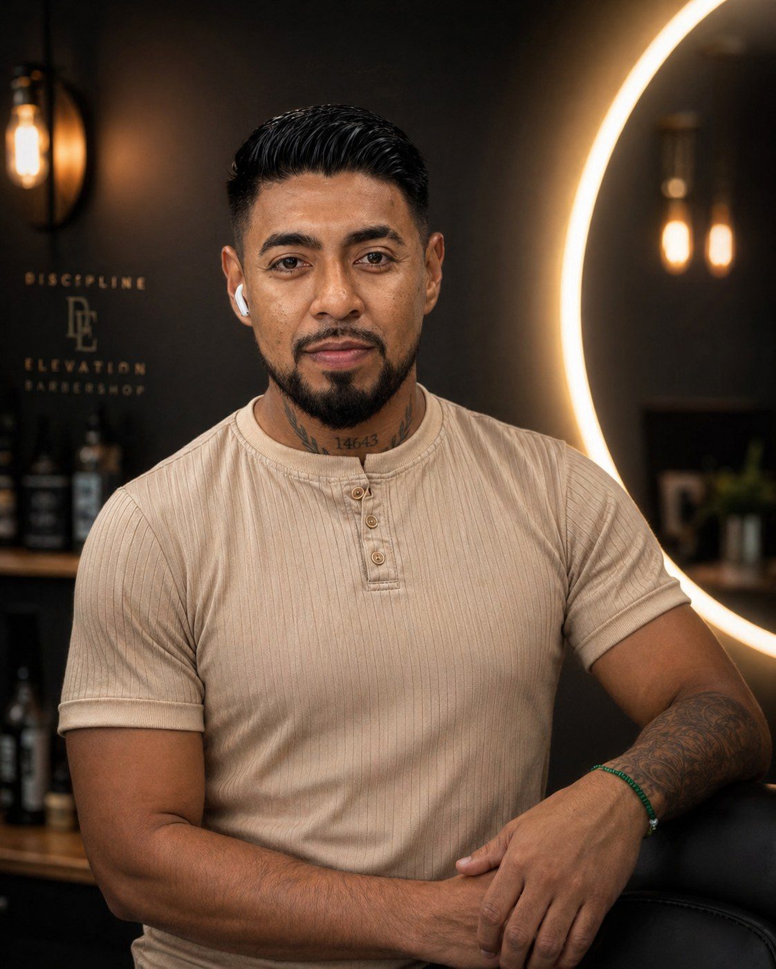 The True Barbershop owner — modern barber portrait.
